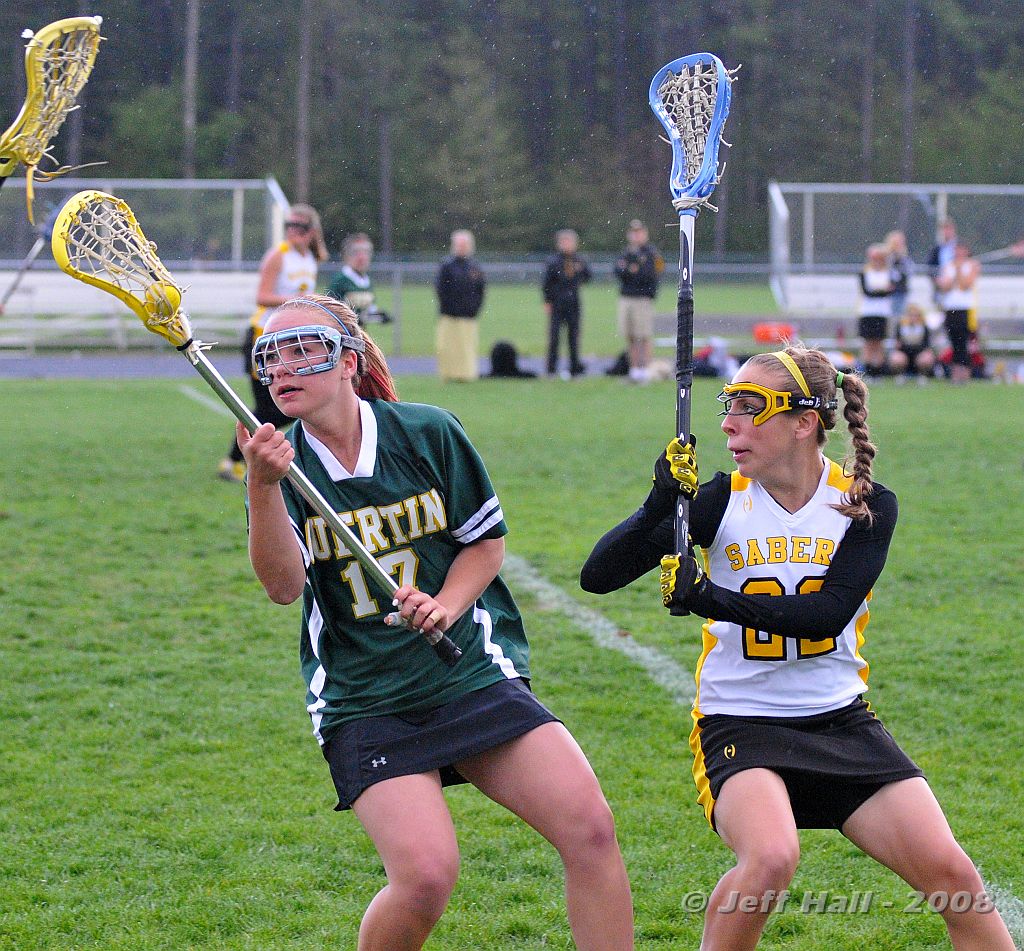 JLH_1199.JPG - Delaney Brault aims to take the ball away from her BG counterpart